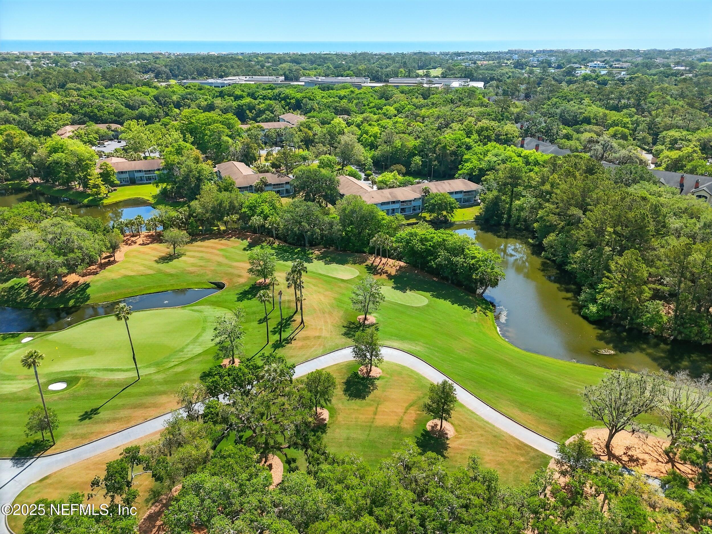 150 Veracruz Drive, Unit 537 Ponte Vedra Beach, FL 32082 - Photo 2 of 14 an aerial view of residential houses with outdoor space and swimming pool