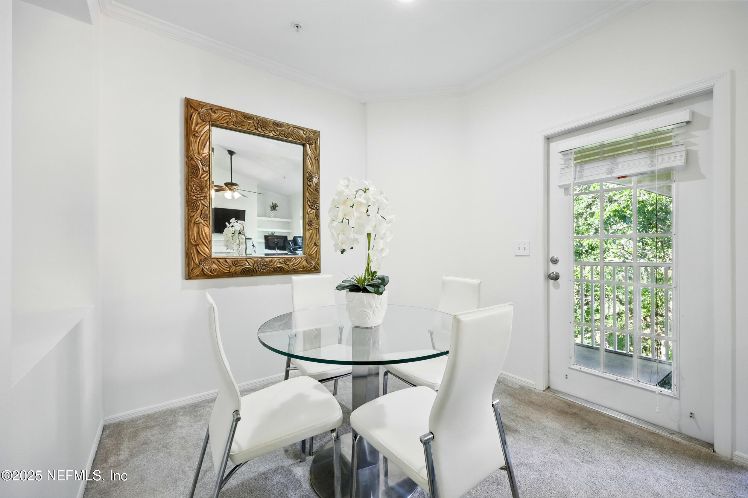 150 Veracruz Drive, Unit 537 Ponte Vedra Beach, FL 32082 - Photo 5 of 14 a dining room with furniture and window