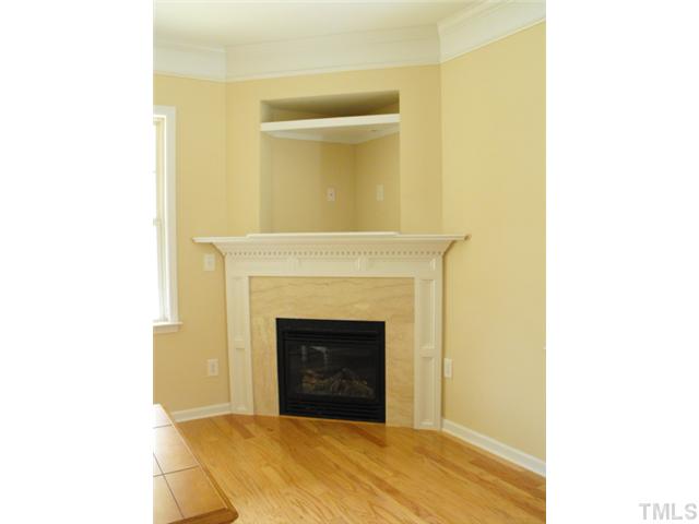 149 Deacon Ridge Street Wake Forest, NC 27587 - Photo 4 of 22 Beautiful detail on Fireplace surround!