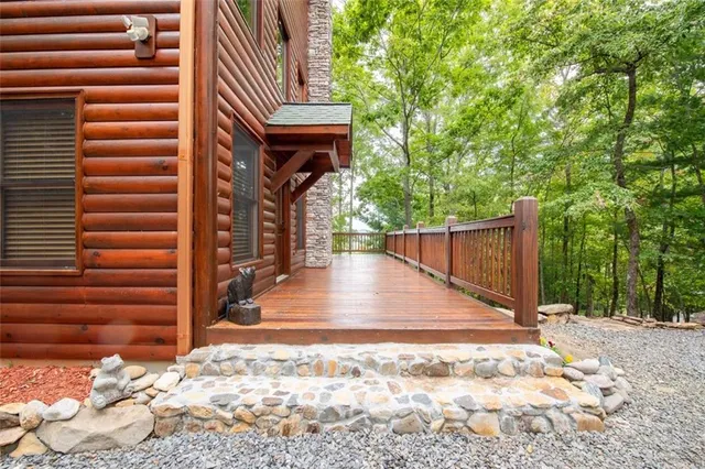 a living room with fireplace furniture and a flat screen tv