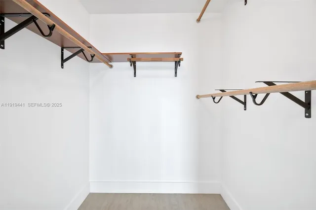 a view of small space with racks on the wall