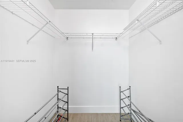 a view of a room with racks on the wall