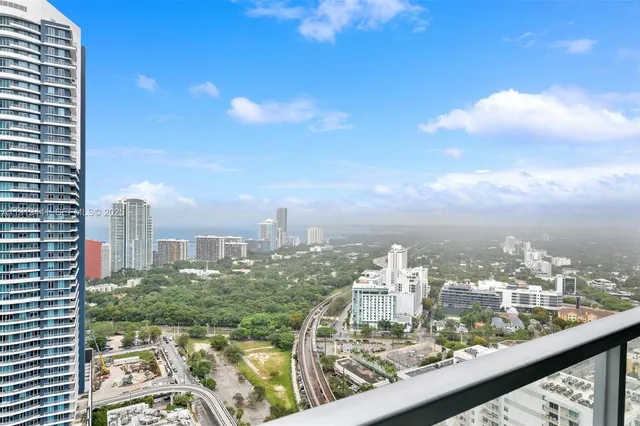 a view of a city from a balcony
