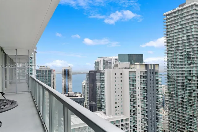 a view of a city with tall buildings