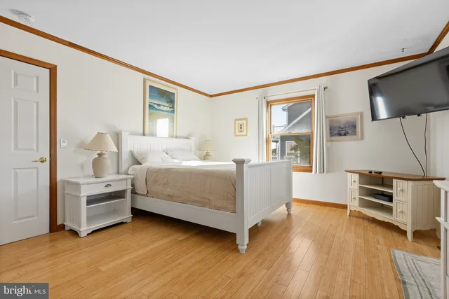 a room with a bed and a window