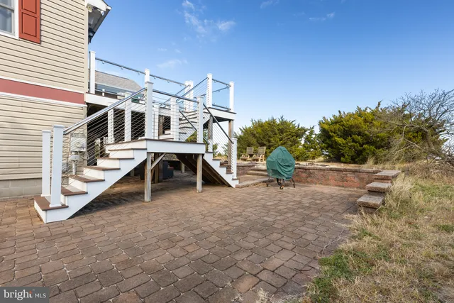 a view of roof deck with a backyard