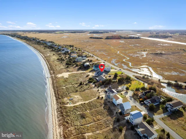 a view of swimming pool with seating area