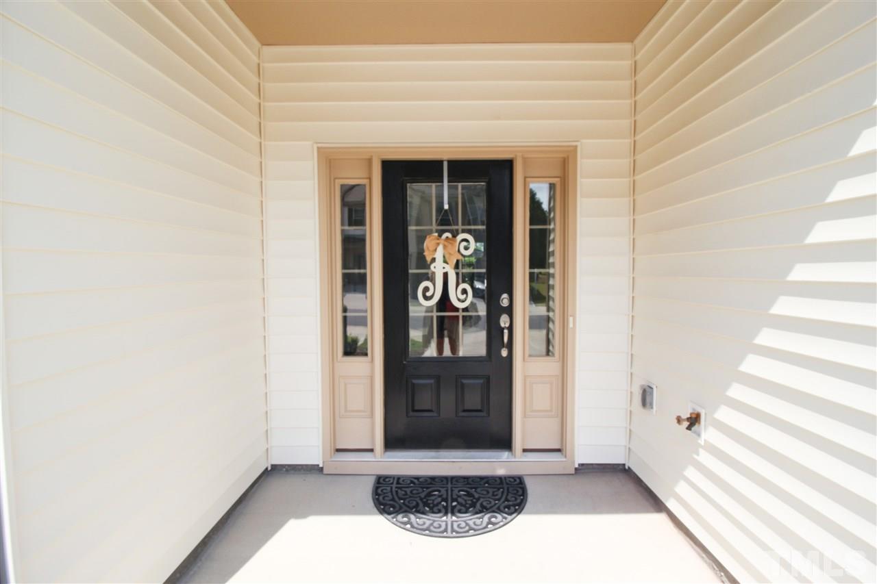 1045 Grand Ridge Drive Rolesville, NC 27571 - Photo 2 of 23 a view of entryway door