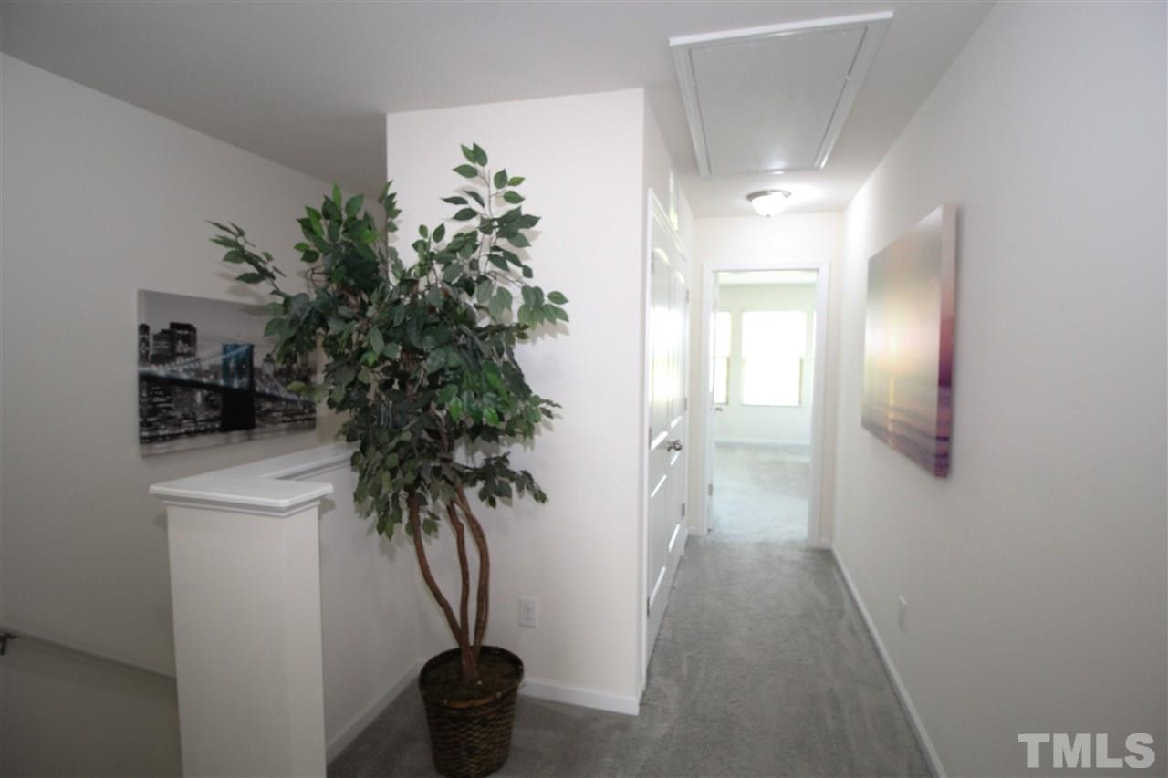 1045 Grand Ridge Drive Rolesville, NC 27571 - Photo 17 of 23 a view of entryway with wooden floor