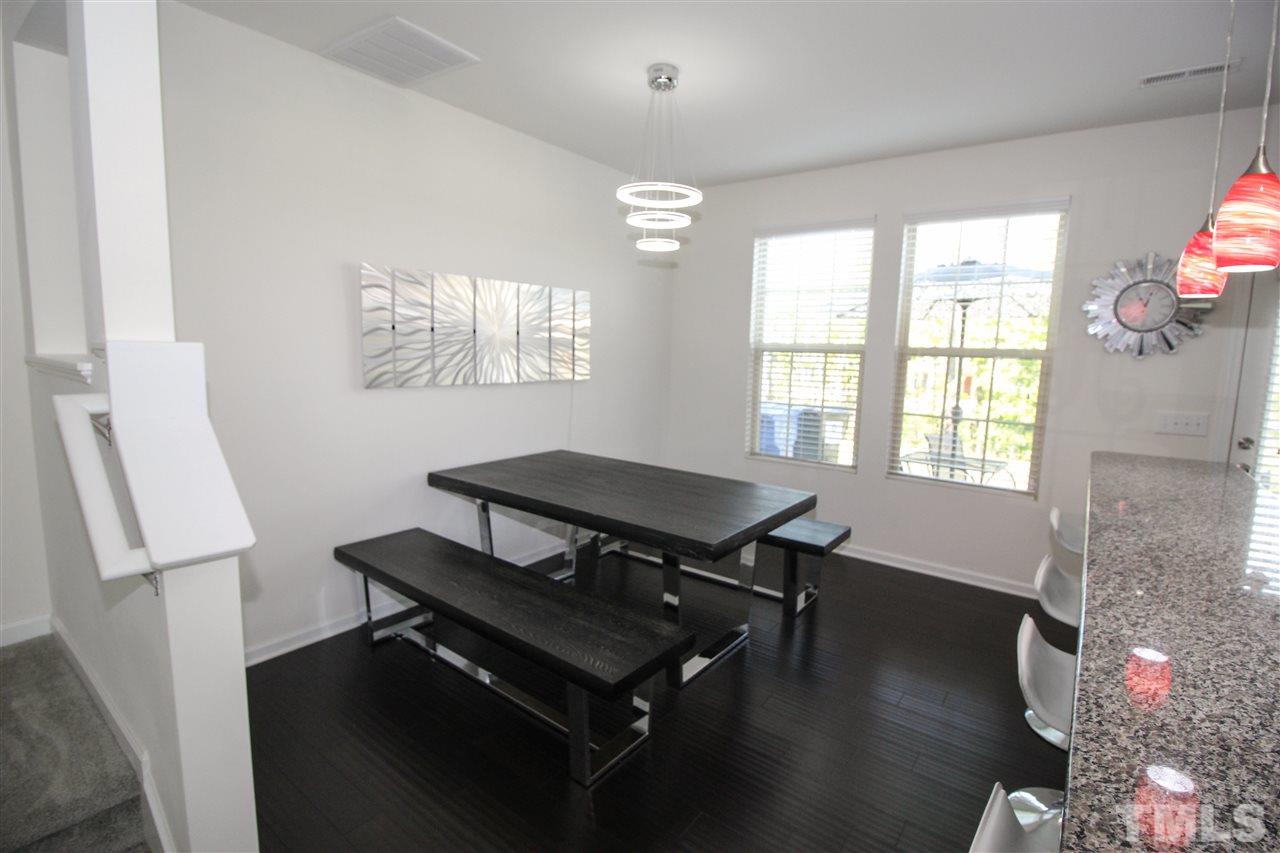 1045 Grand Ridge Drive Rolesville, NC 27571 - Photo 6 of 23 a living room with furniture and a window