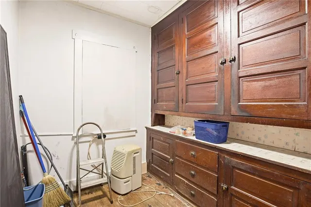 a kitchen with a sink and a window