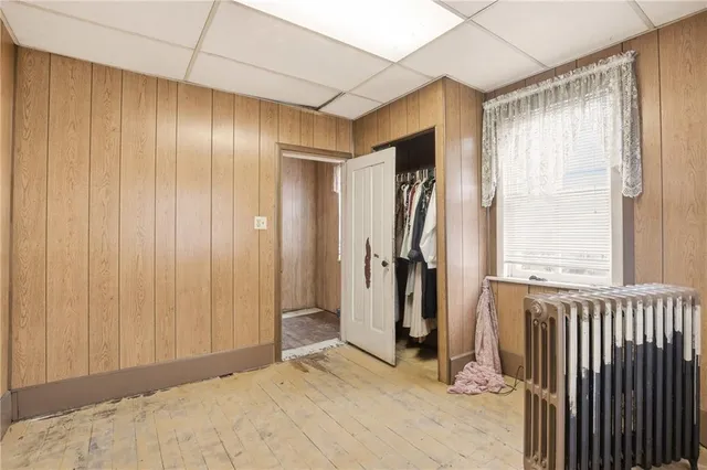 a view of a room with a large window