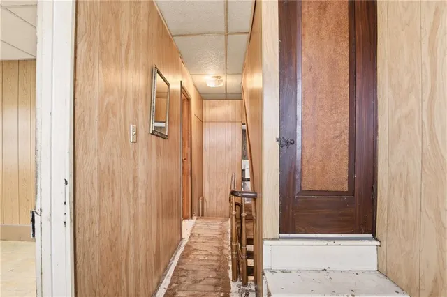 a bedroom with a bed and a view of balcony