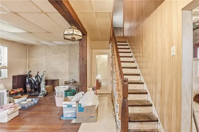 a view of hall way with furniture