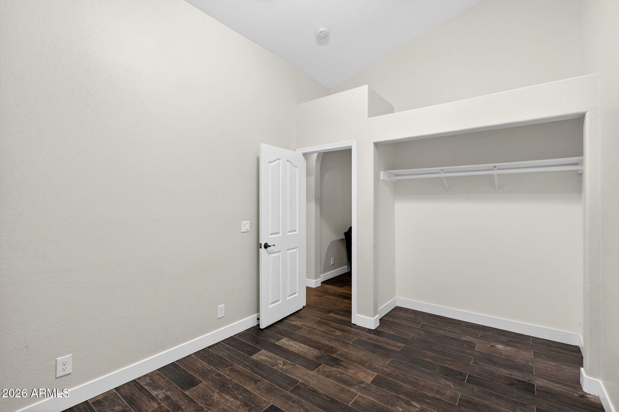 3242 North Ricardo Circle Mesa, AZ 85215 - Photo 40 of 79 a view of an empty room with wooden floor