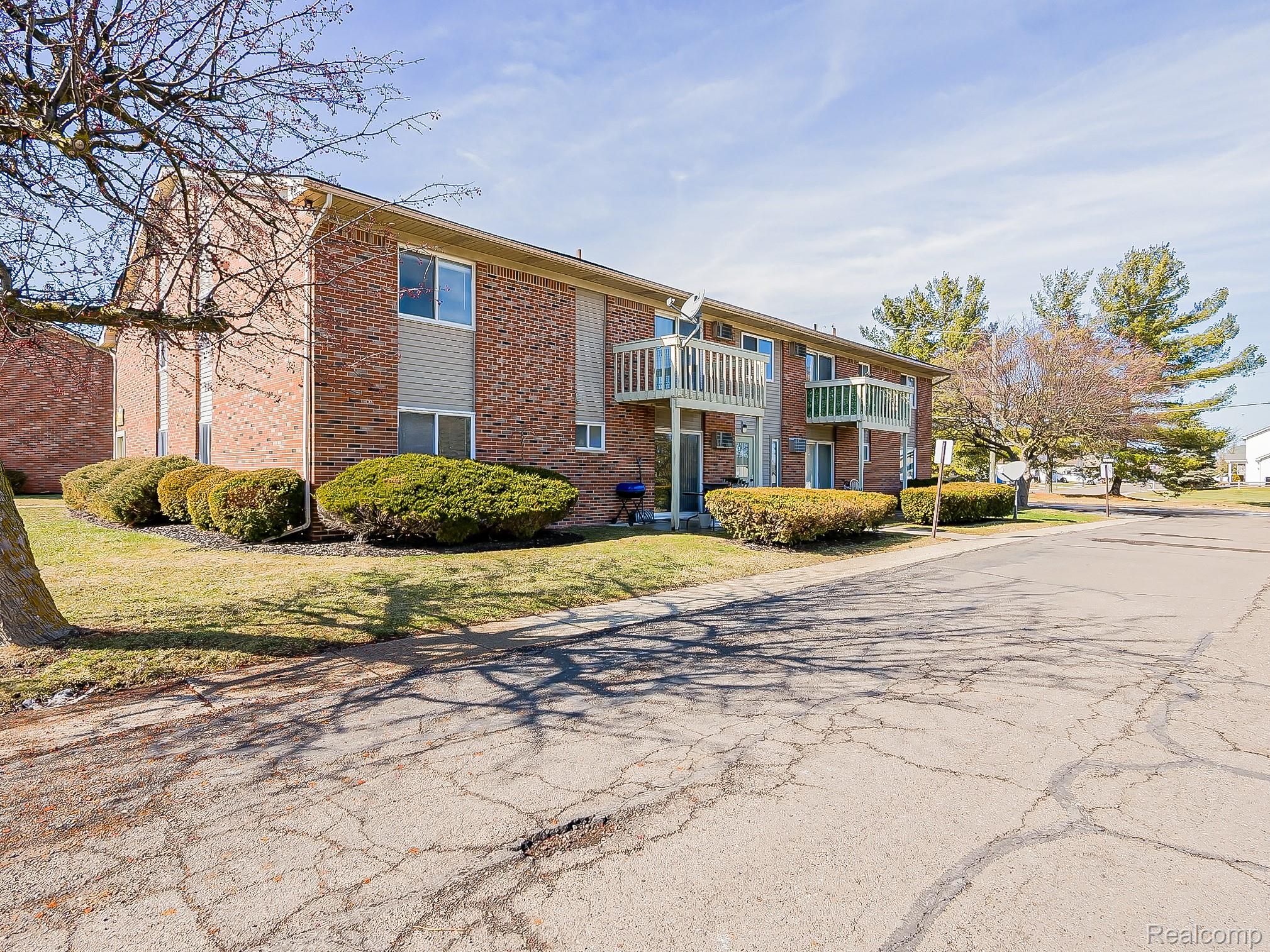 125 East Van Riper Road, Unit 7 Fowlerville, MI 48836 - Photo 24 of 26 View of apartment building / complex