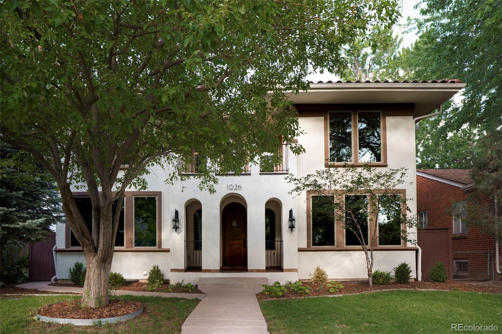1026 South Cook Street Denver, CO 80209 - Photo 1 of 34 a view of a house with outdoor space