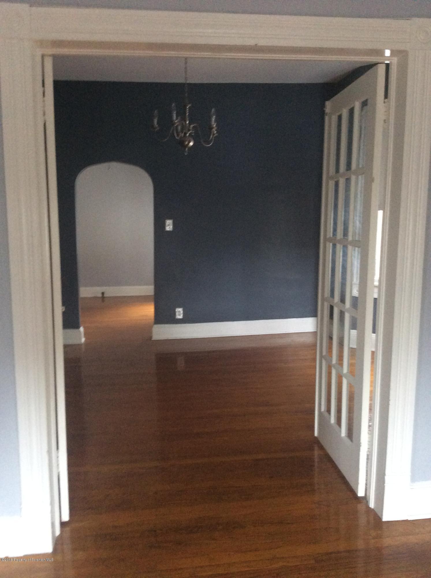 622 North 624 Main, Unit 4 Scranton, PA 18504 - Photo 11 of 19 a view of a hallway with wooden floor