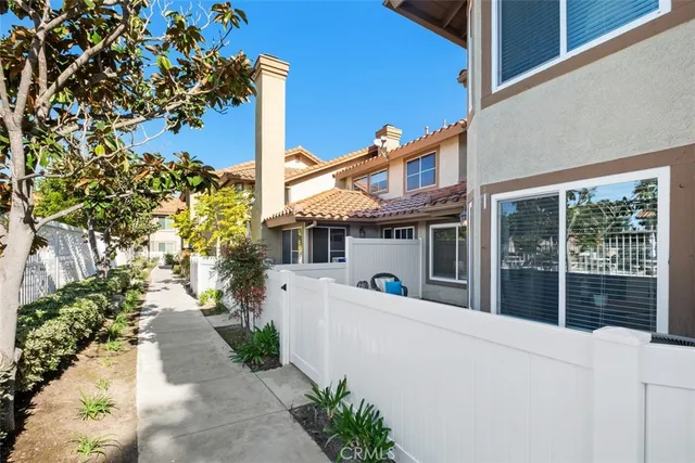 a view of a house with a small garden