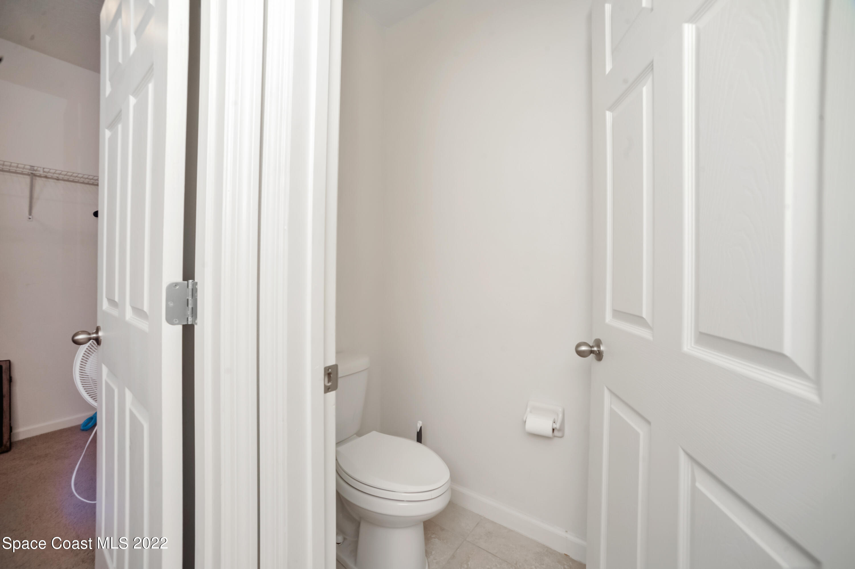 4720 Pagosa Springs Circle Melbourne, FL 32901 - Photo 19 of 24 a bathroom with a toilet and a shower