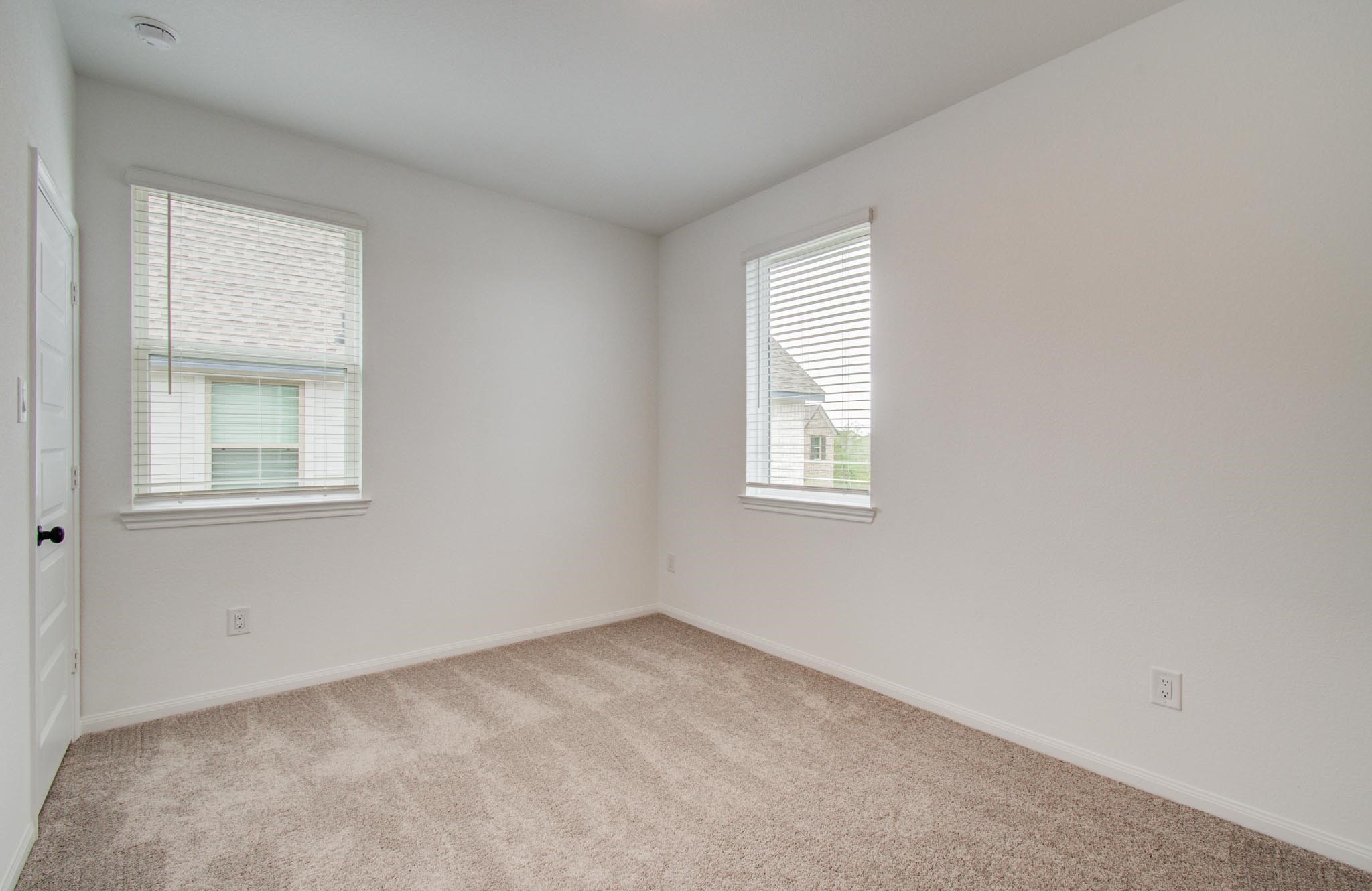 7231 Yarrow Blossom Court Katy, TX 77493 - Photo 41 of 49 an empty room with windows