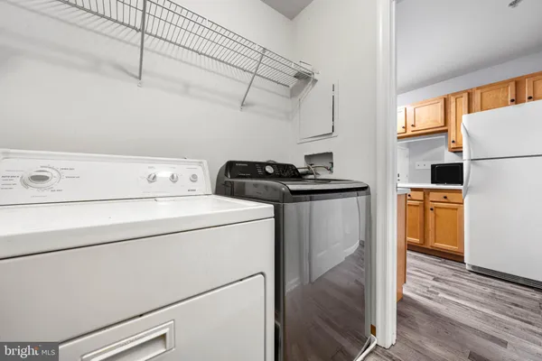 a utility room with dryer and washer