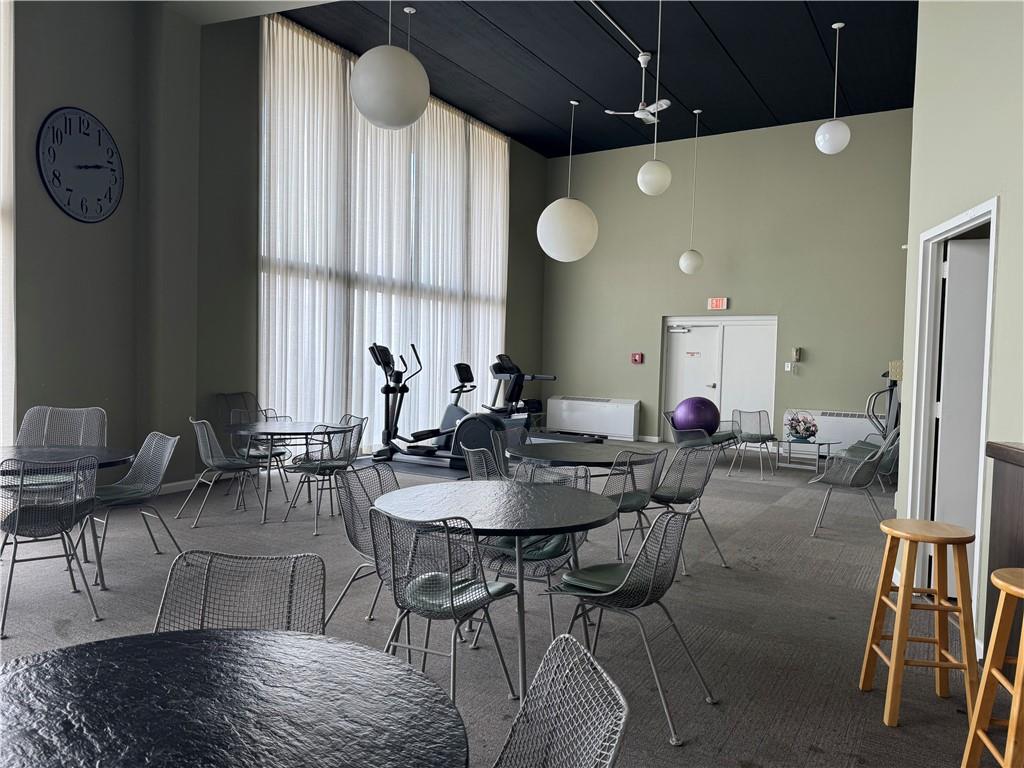 1160 Bower Hill Road, Unit 314A Pittsburgh, PA 15243 - Photo 23 of 24 a view of a dining room with furniture and a chandelier