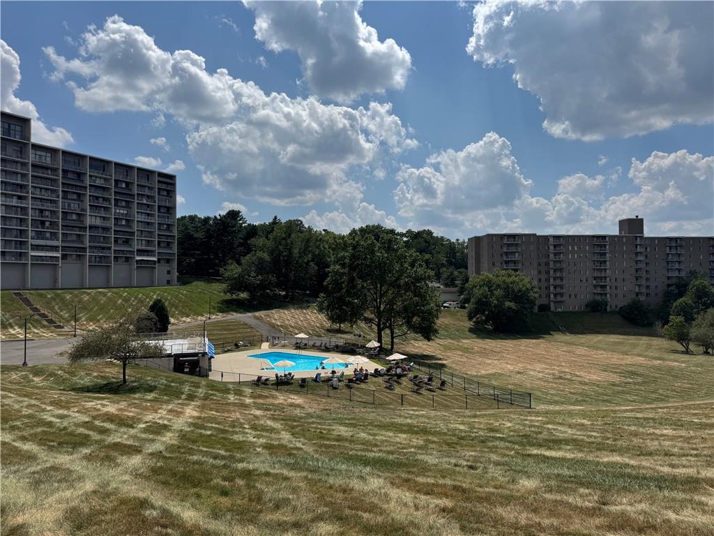 1160 Bower Hill Road, Unit 314A Pittsburgh, PA 15243 - Photo 24 of 24 a backyard of a house with table and chairs