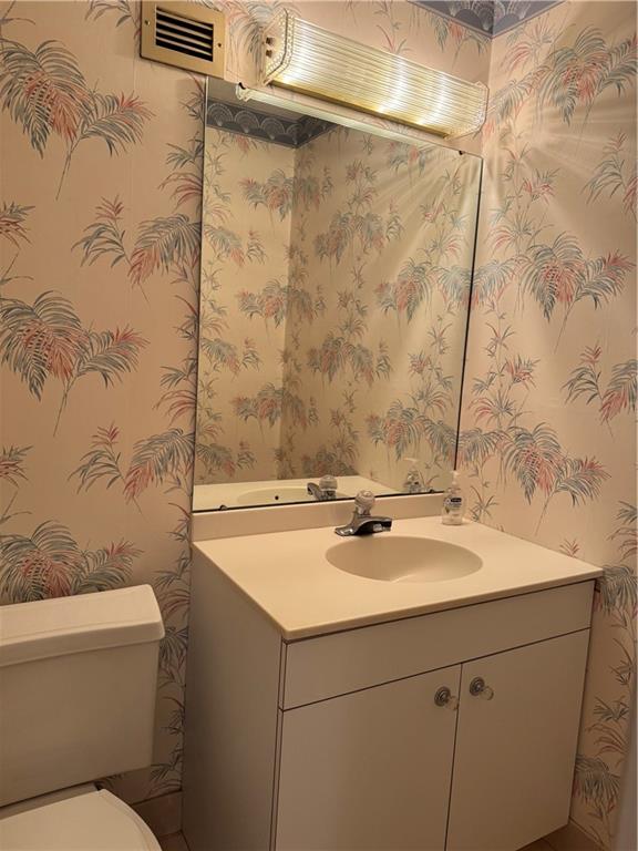 1160 Bower Hill Road, Unit 314A Pittsburgh, PA 15243 - Photo 8 of 24 a bathroom with a sink and mirror with toilet