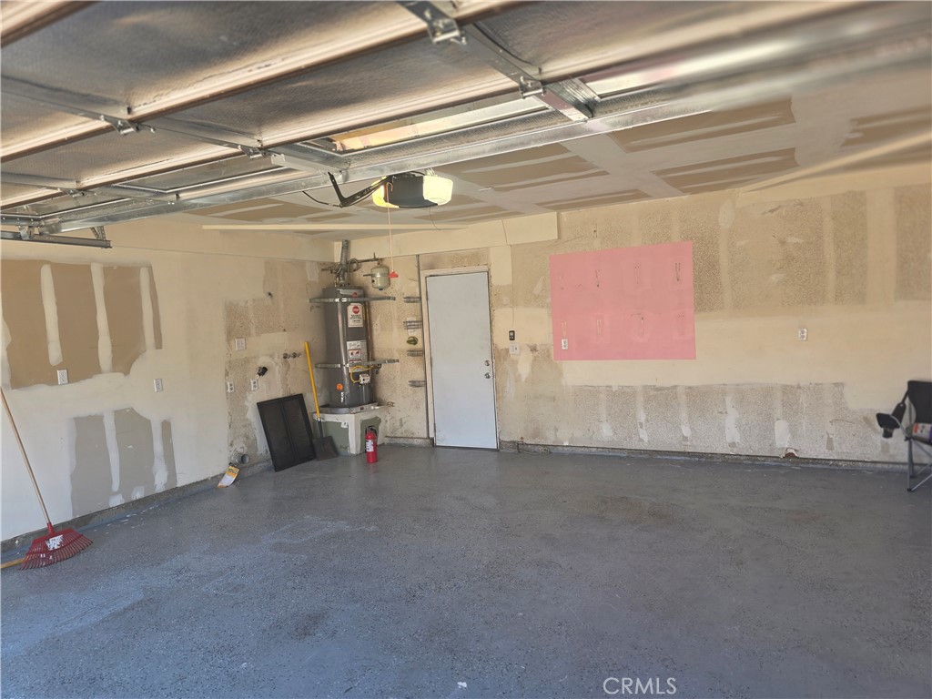 7800 Reagan Road Jurupa Valley, CA 92509 - Photo 32 of 32 Insulated and drywalled 2 car garage