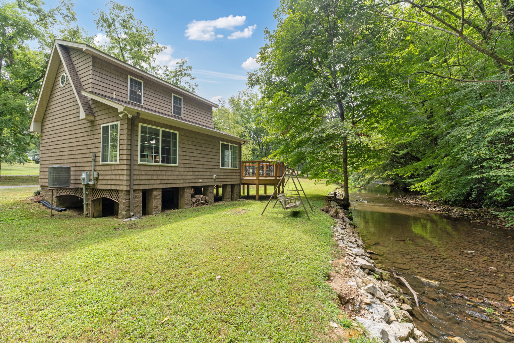 400 Cascade Hollow Road Normandy, TN 37360 - Photo 29 of 56 a backyard of a house with table and chairs