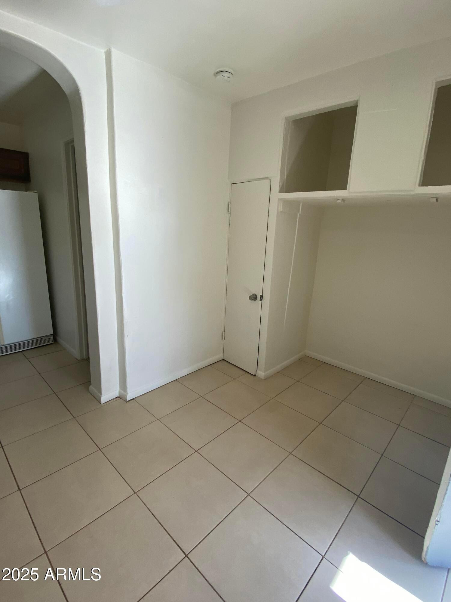 3810 North 9th Place, Unit 1 Phoenix, AZ 85014 - Photo 4 of 7 a view of a utility room with closet