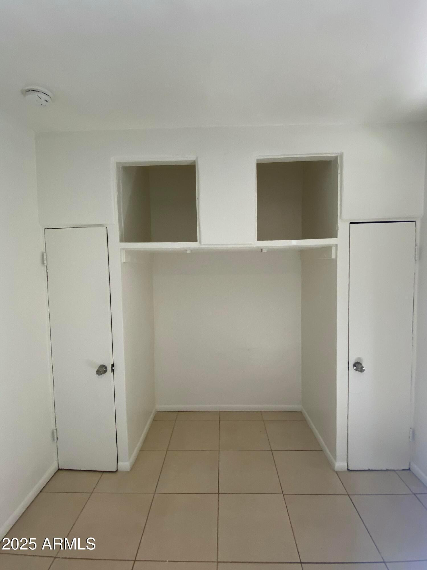 3810 North 9th Place, Unit 1 Phoenix, AZ 85014 - Photo 5 of 7 a view of a room with an empty space