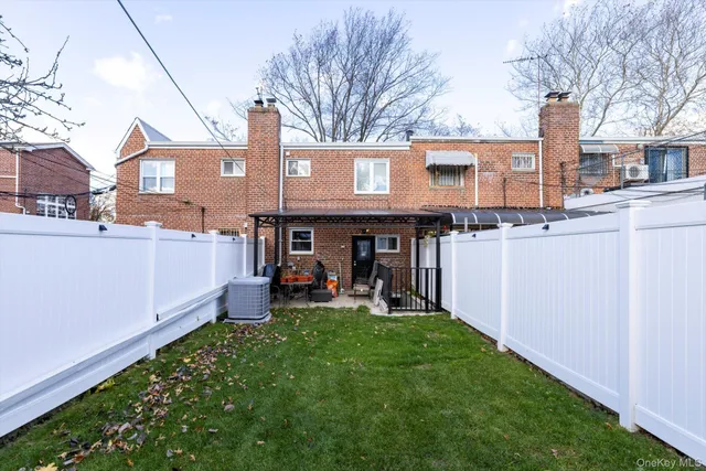 a front view of a house with yard