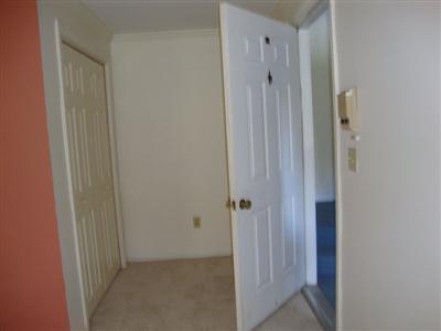 101 Depot Road, Unit 18 Chatham, MA 02633 - Photo 4 of 16 a view of a bathroom from the hallway