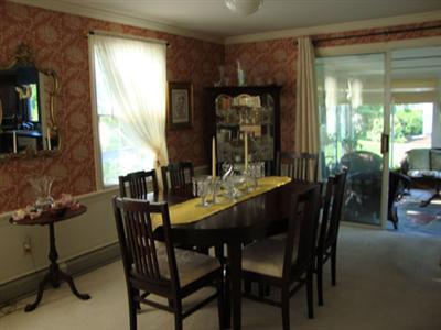 101 Depot Road, Unit 18 Chatham, MA 02633 - Photo 6 of 16 a dining room with furniture and window