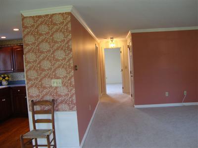 101 Depot Road, Unit 18 Chatham, MA 02633 - Photo 10 of 16 a view of a livingroom with furniture and staircase