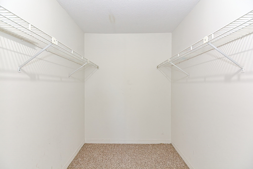 1811 Franklin Crossing Road, Unit 1811 Franklin, MA 02038 - Photo 20 of 31 a view of small space with empty racks
