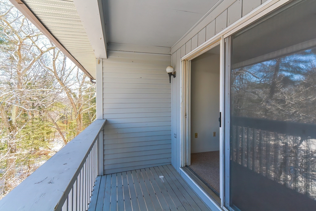 1811 Franklin Crossing Road, Unit 1811 Franklin, MA 02038 - Photo 26 of 31 a view of balcony with wooden floor