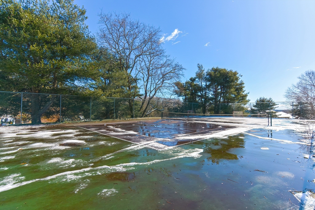 1811 Franklin Crossing Road, Unit 1811 Franklin, MA 02038 - Photo 30 of 31 a view of a tennis court