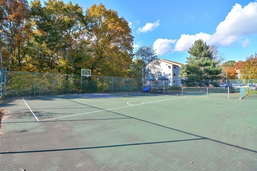 1811 Franklin Crossing Road, Unit 1811 Franklin, MA 02038 - Photo 3 of 31 a view of a tennis court