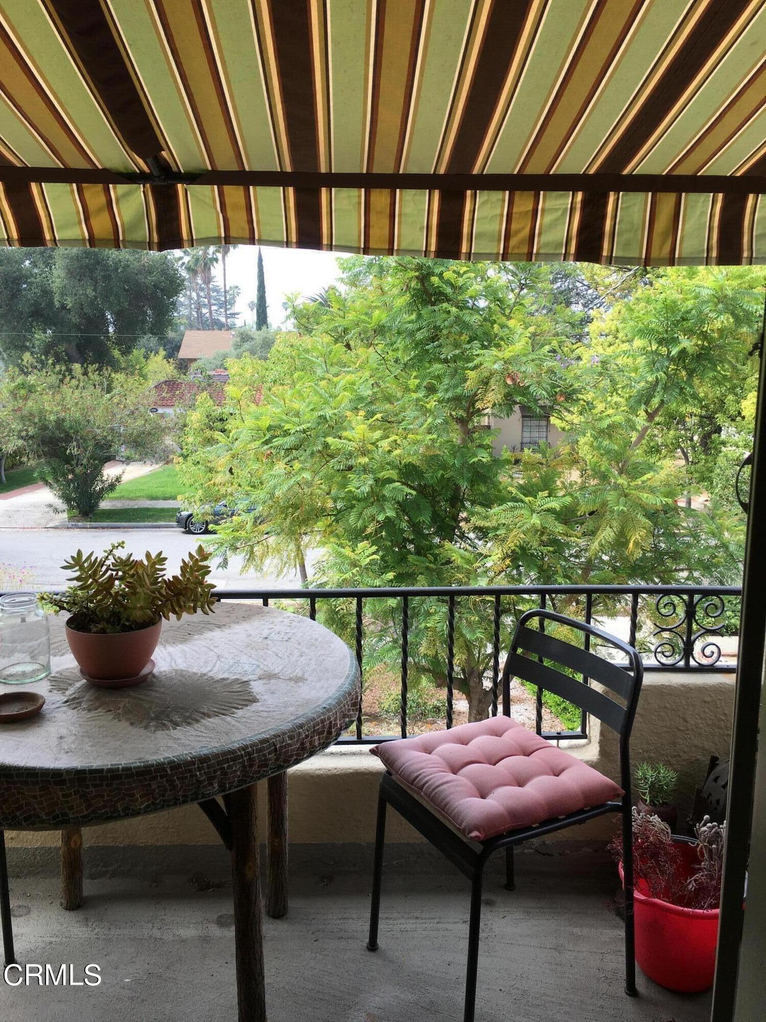 927 Atchison Street Pasadena, CA 91104 - Photo 11 of 13 a room with furniture and a window