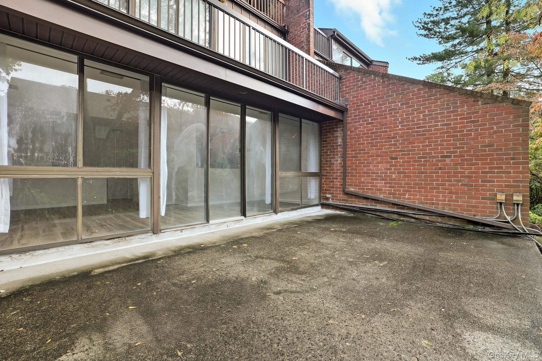 150 Bedford Road, Unit 12A Chappaqua, NY 10514 - Photo 16 of 17 a view of a house with a street