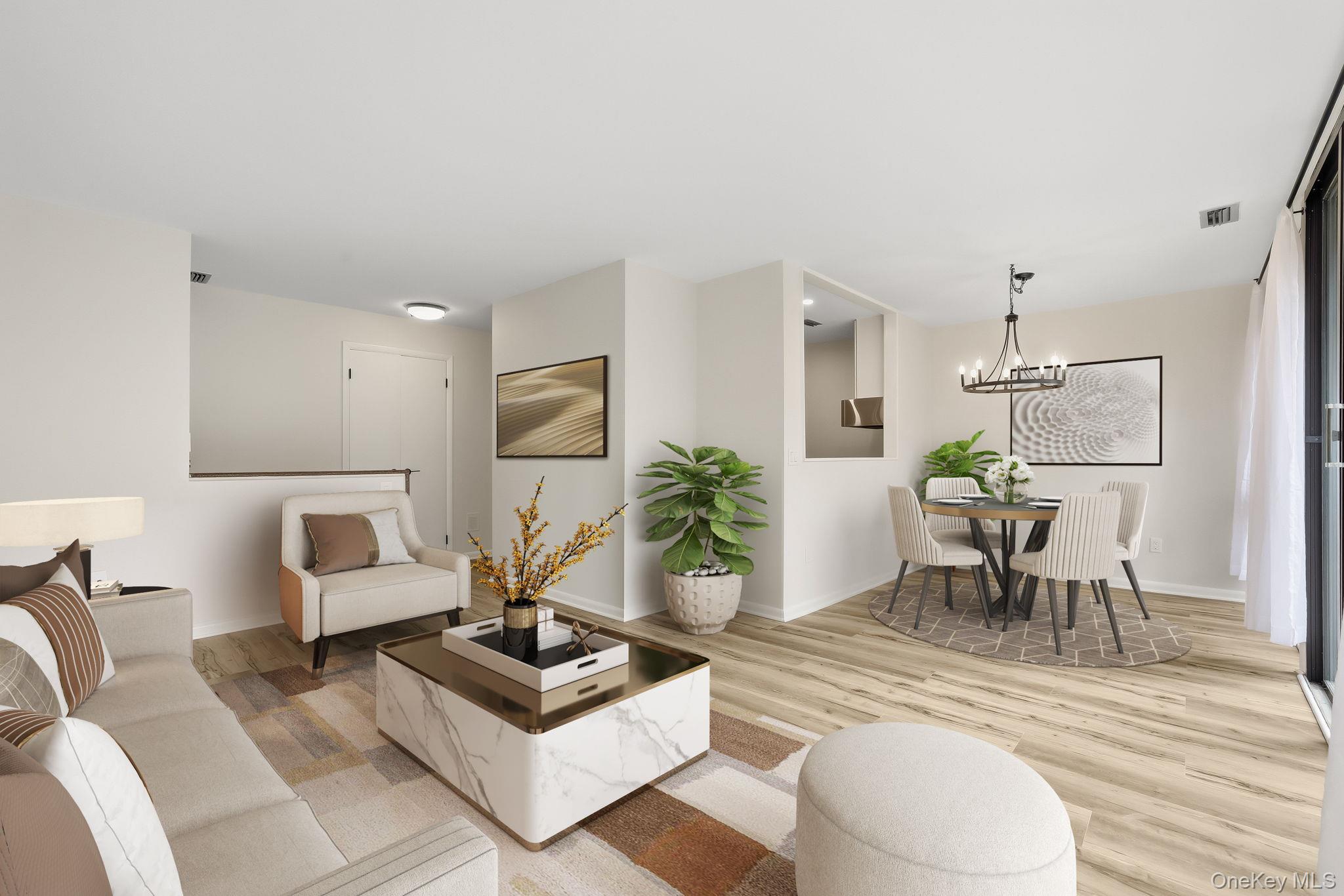 150 Bedford Road, Unit 12A Chappaqua, NY 10514 - Photo 3 of 17 a living room with furniture potted plant and white walls