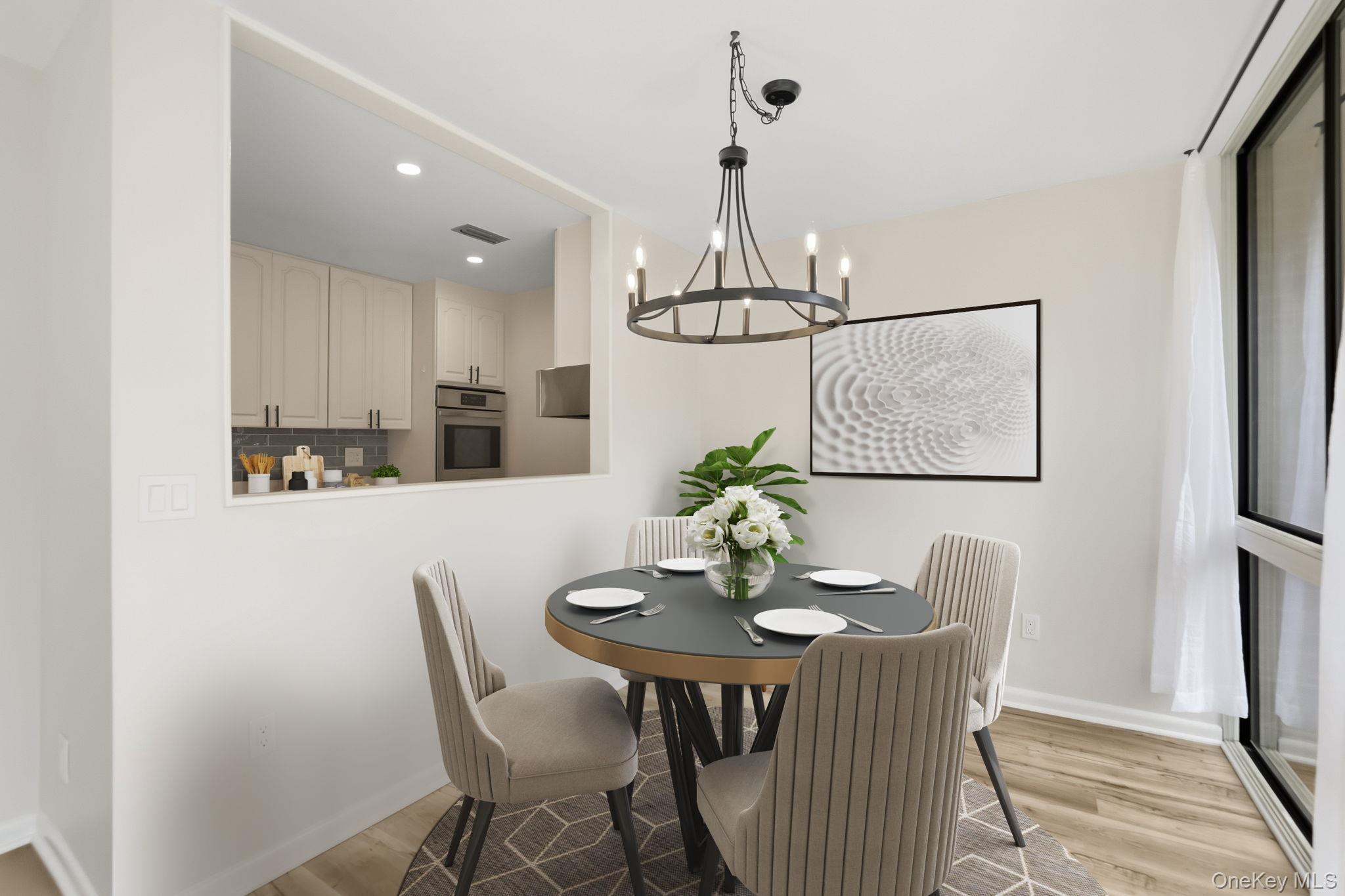 150 Bedford Road, Unit 12A Chappaqua, NY 10514 - Photo 5 of 17 a view of a dining room with furniture