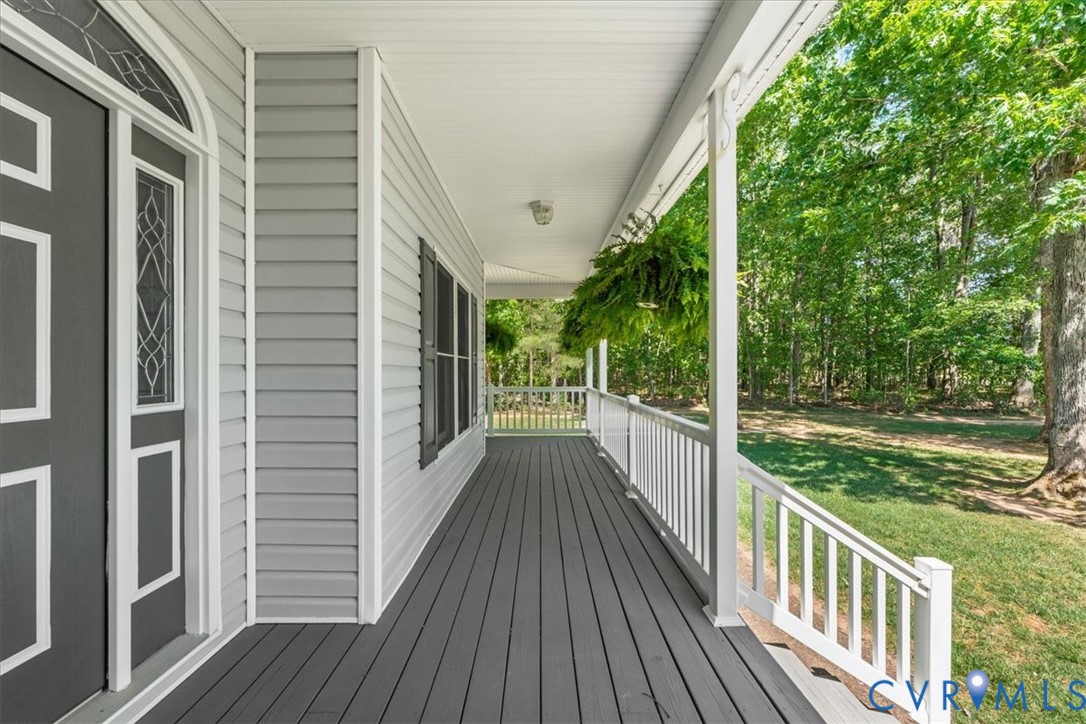 3060 Moyer Road Powhatan, VA 23139 - Photo 9 of 66 Expansive covered front porch with dark gray decki