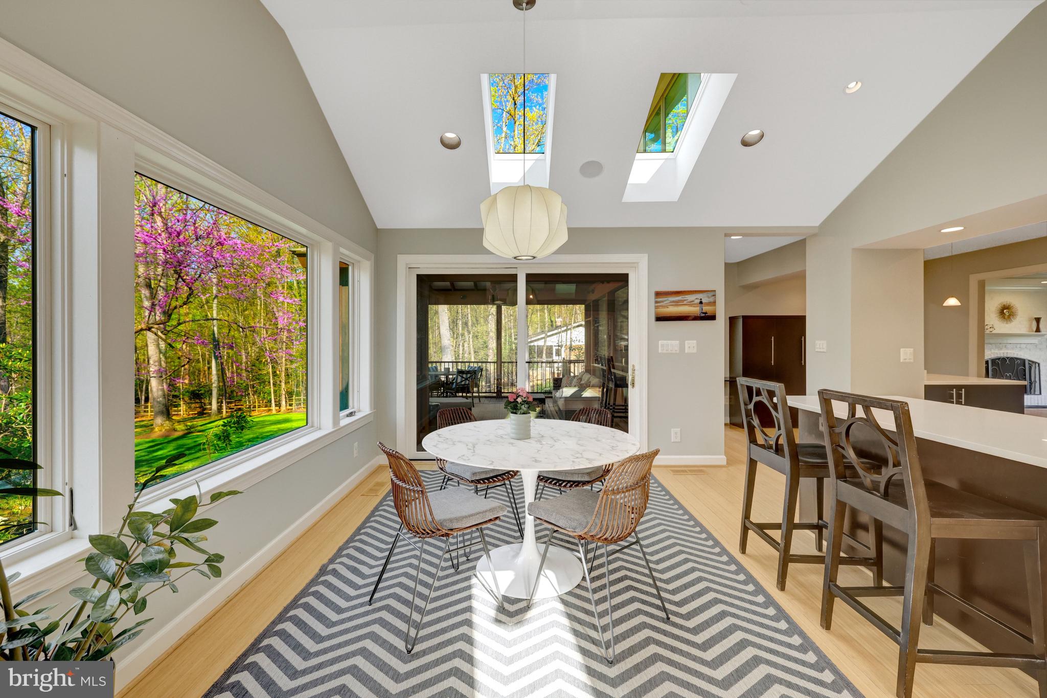 11809 State Rte 4707 Reston, VA 20191 - Photo 13 of 70 The breakfast room opens to the stunning porch.