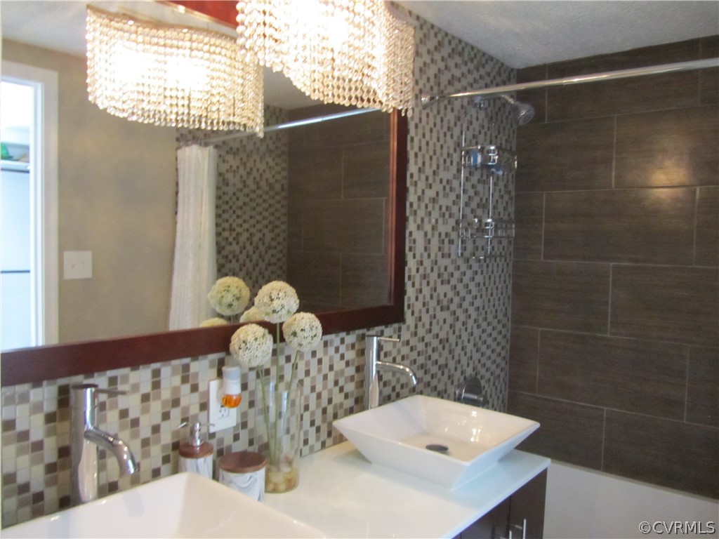314 Buffalo Road Richmond, VA 23223 - Photo 11 of 24 Primary Bath with Double Vanity and Porcelain Floo