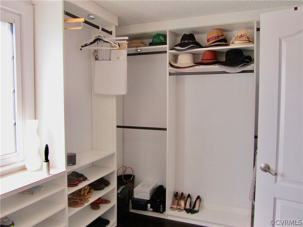 314 Buffalo Road Richmond, VA 23223 - Photo 10 of 24 Primary Bedroom Walk-in Closet with Shelving and S