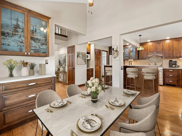 a kitchen with stainless steel appliances a refrigerator and a stove top oven